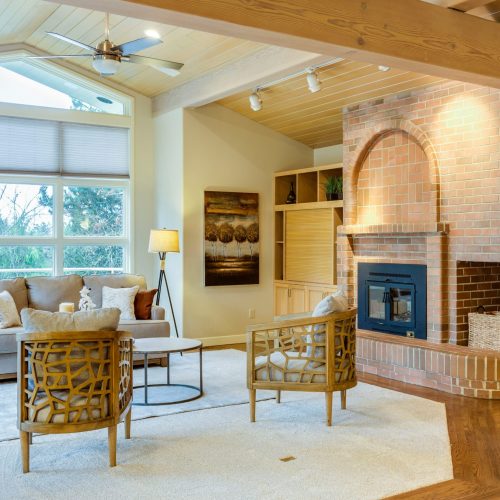 LV with brick fireplace and wood floors (1)